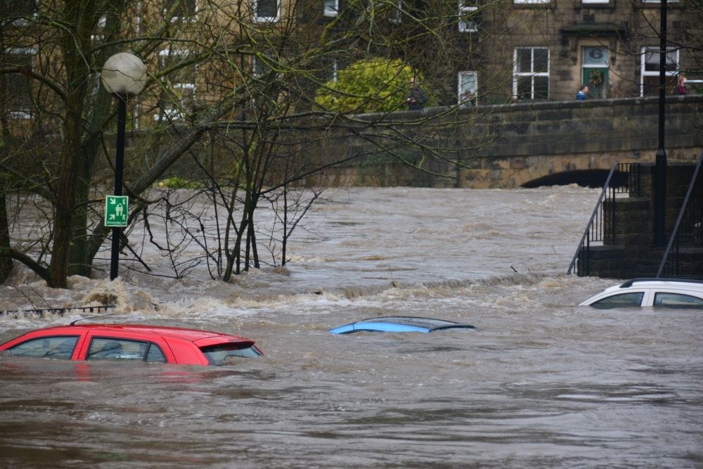 cars submerged in flood waters