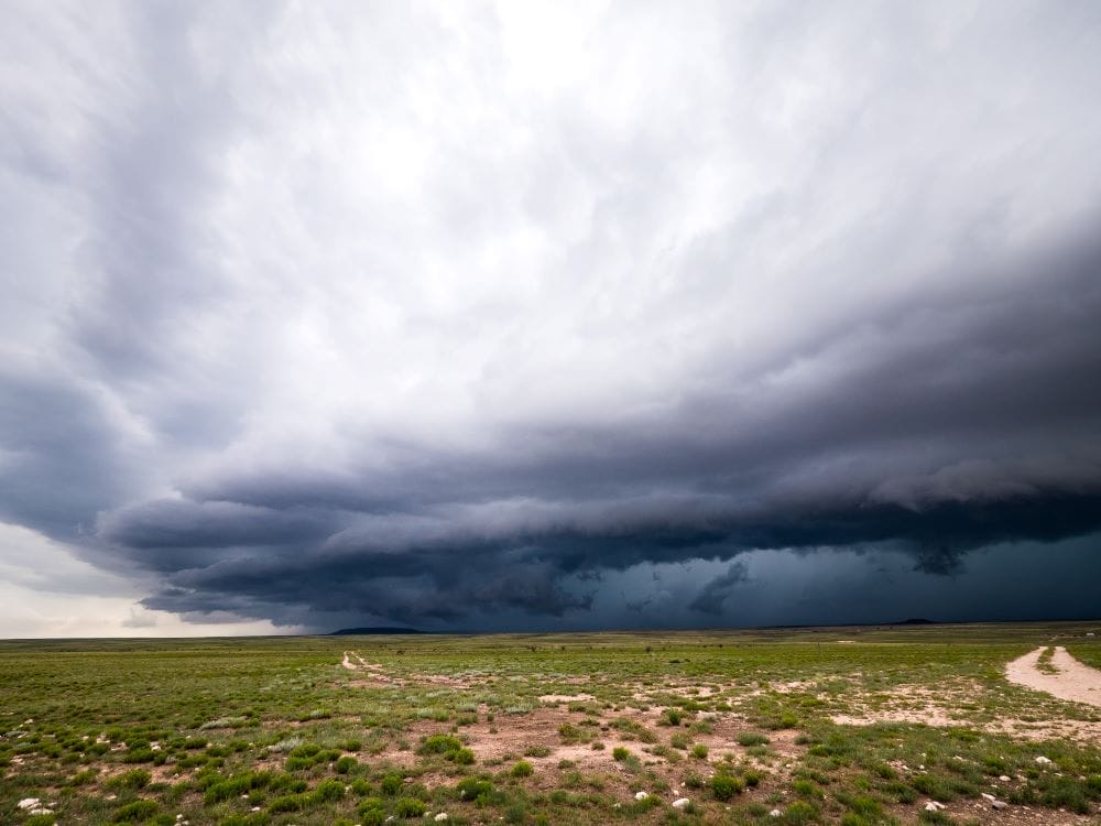 Storm clouds rolling over plains