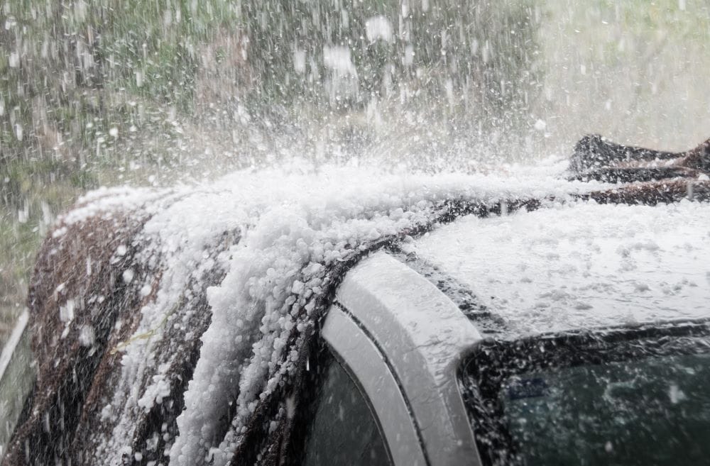 hail pelting car