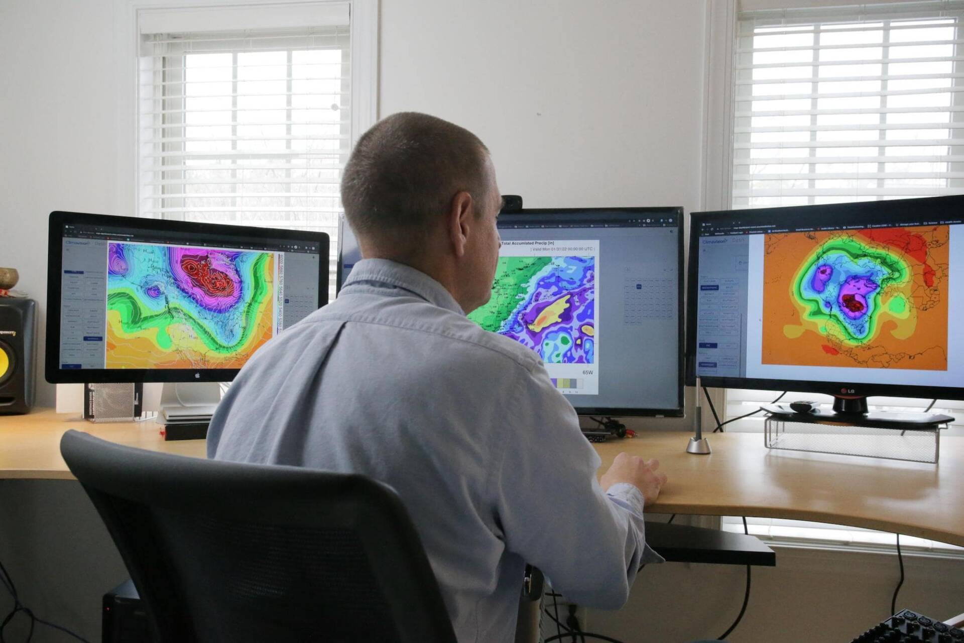 Climate expert at computer